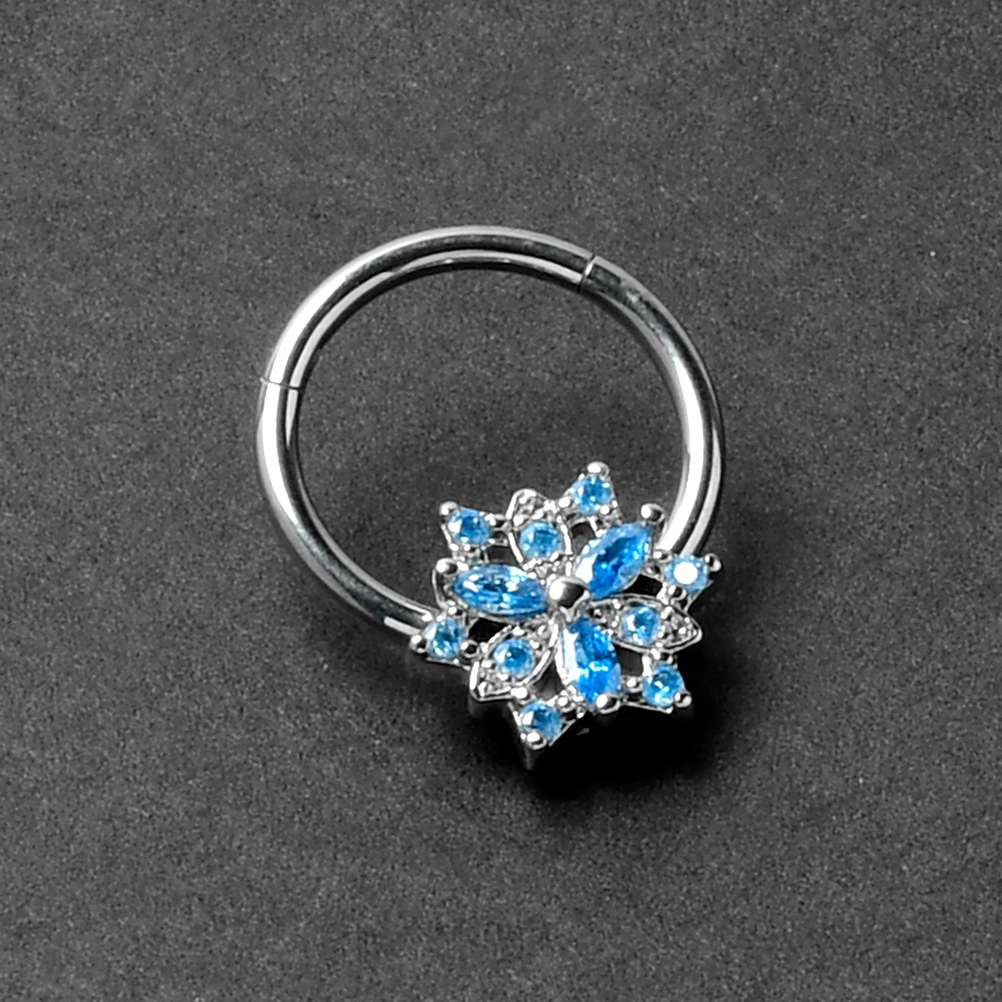 16 Gauge 3/8 Blue CZ Gem Snowflake Style Hinged Segment Ring
