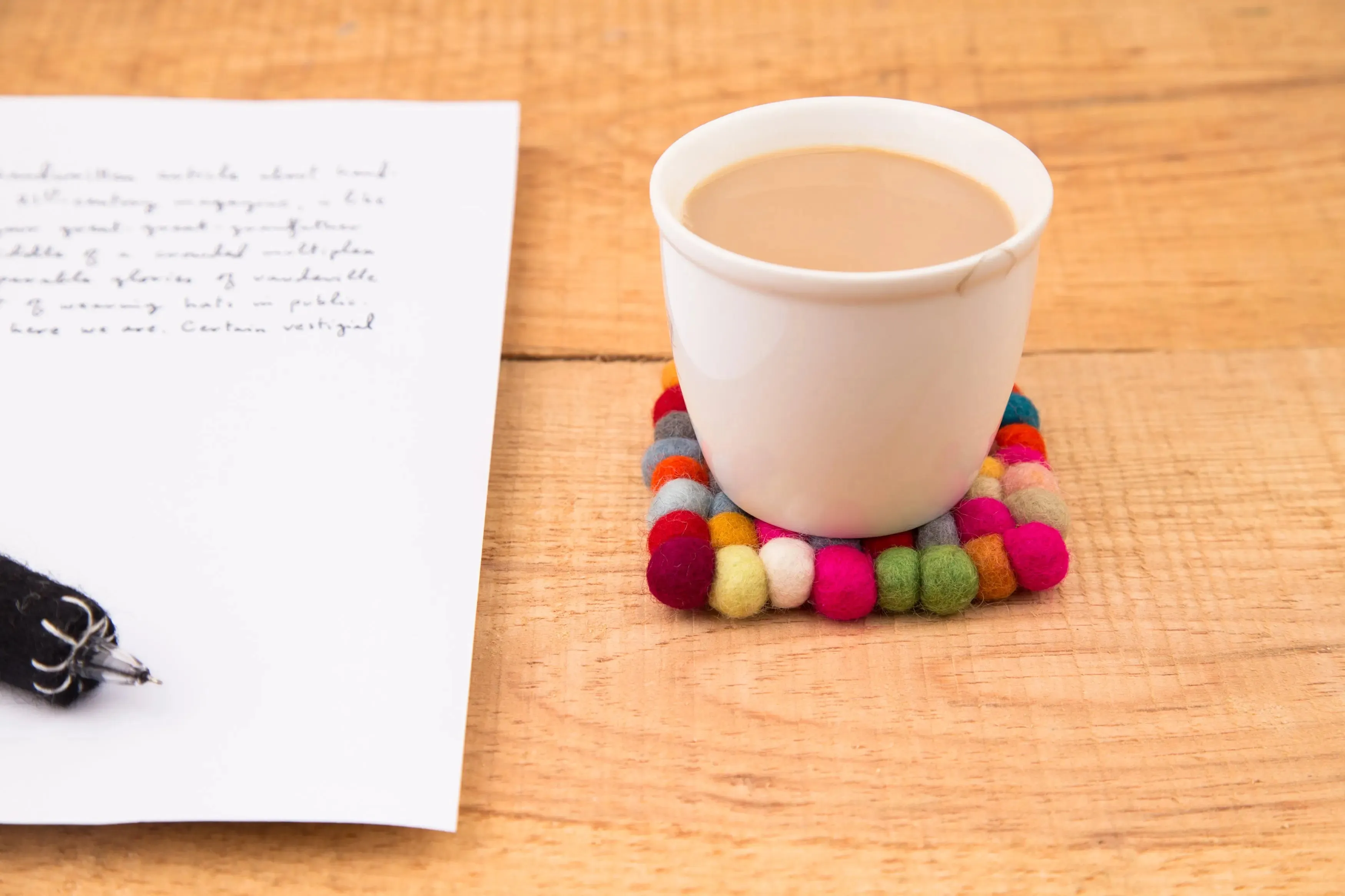 Elevate Your Table Decor with Handcrafted Wool Felt Ball Mats from Nepal – The Perfect Tea Coasters