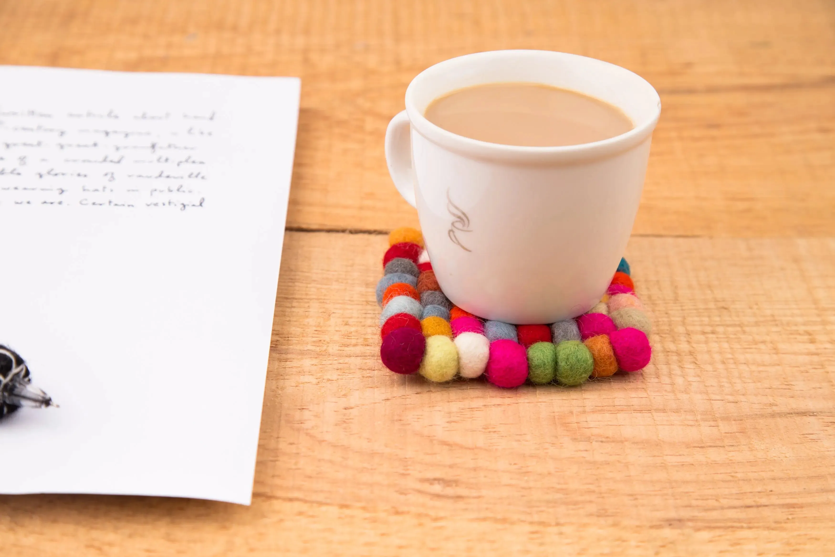 Elevate Your Table Decor with Handcrafted Wool Felt Ball Mats from Nepal – The Perfect Tea Coasters