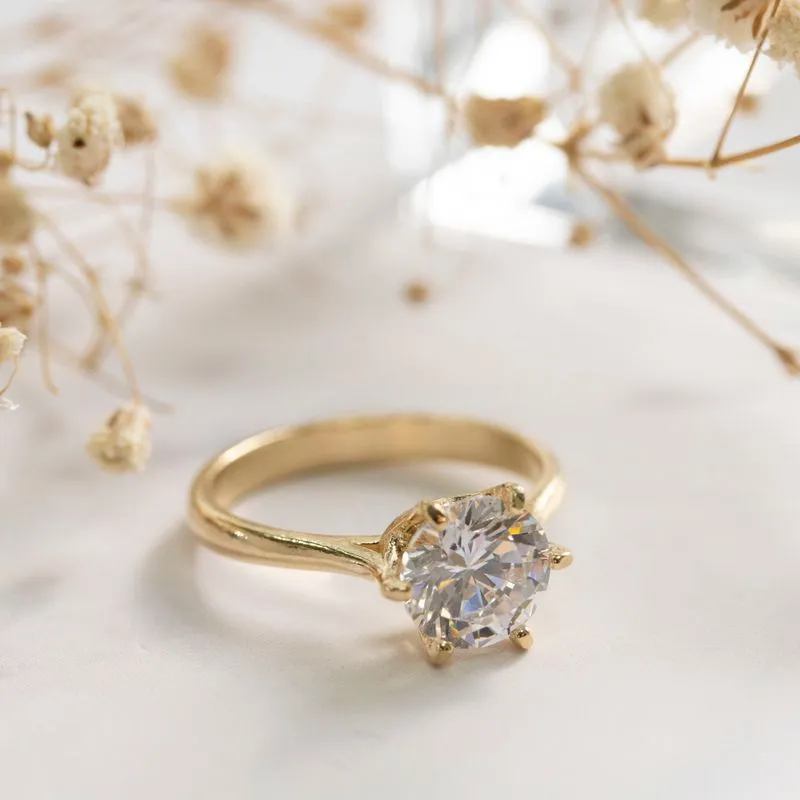 gold plated closed ring with white cz 8mm facet