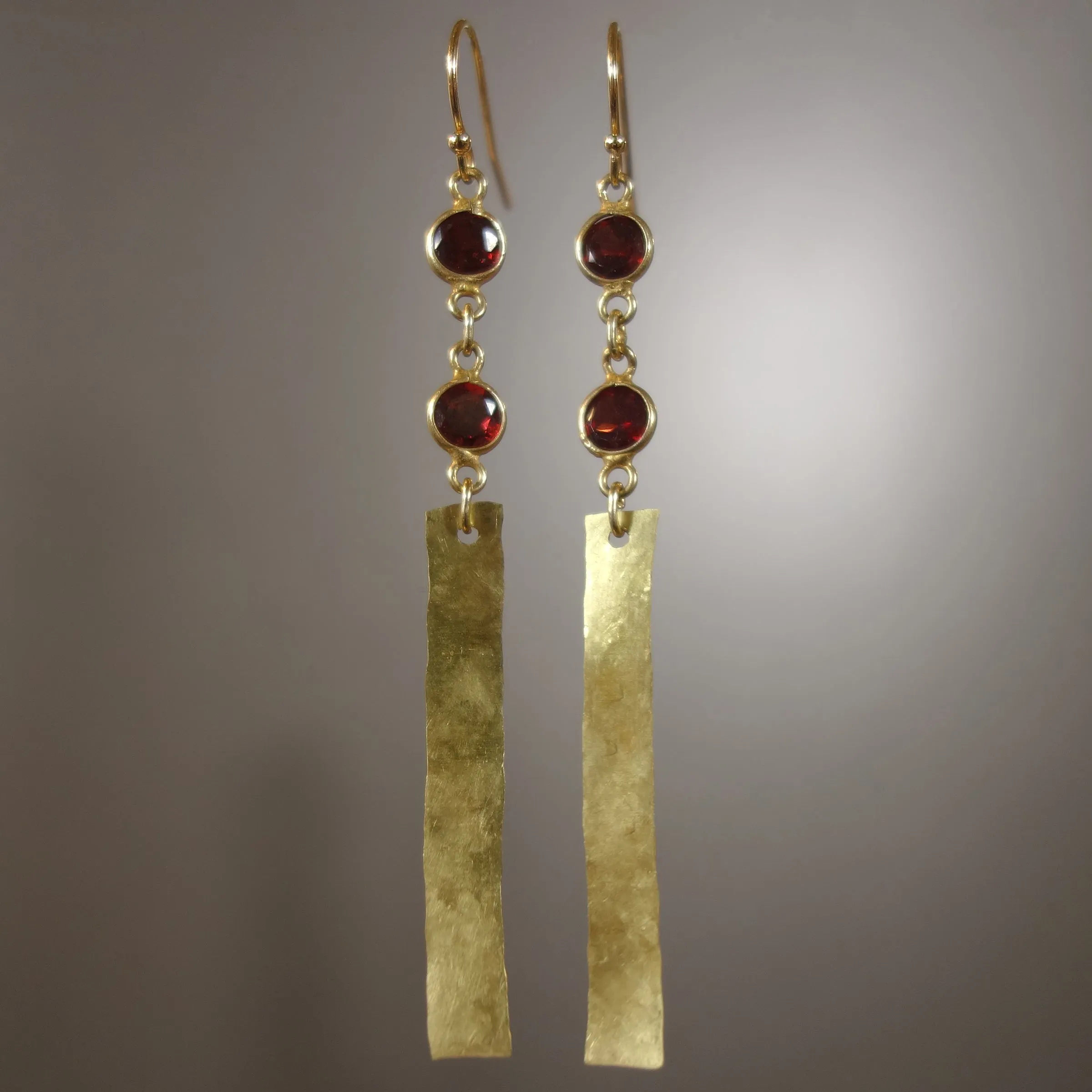 She Shines like Gold in the Sun (garnet, gold, and brass earring)