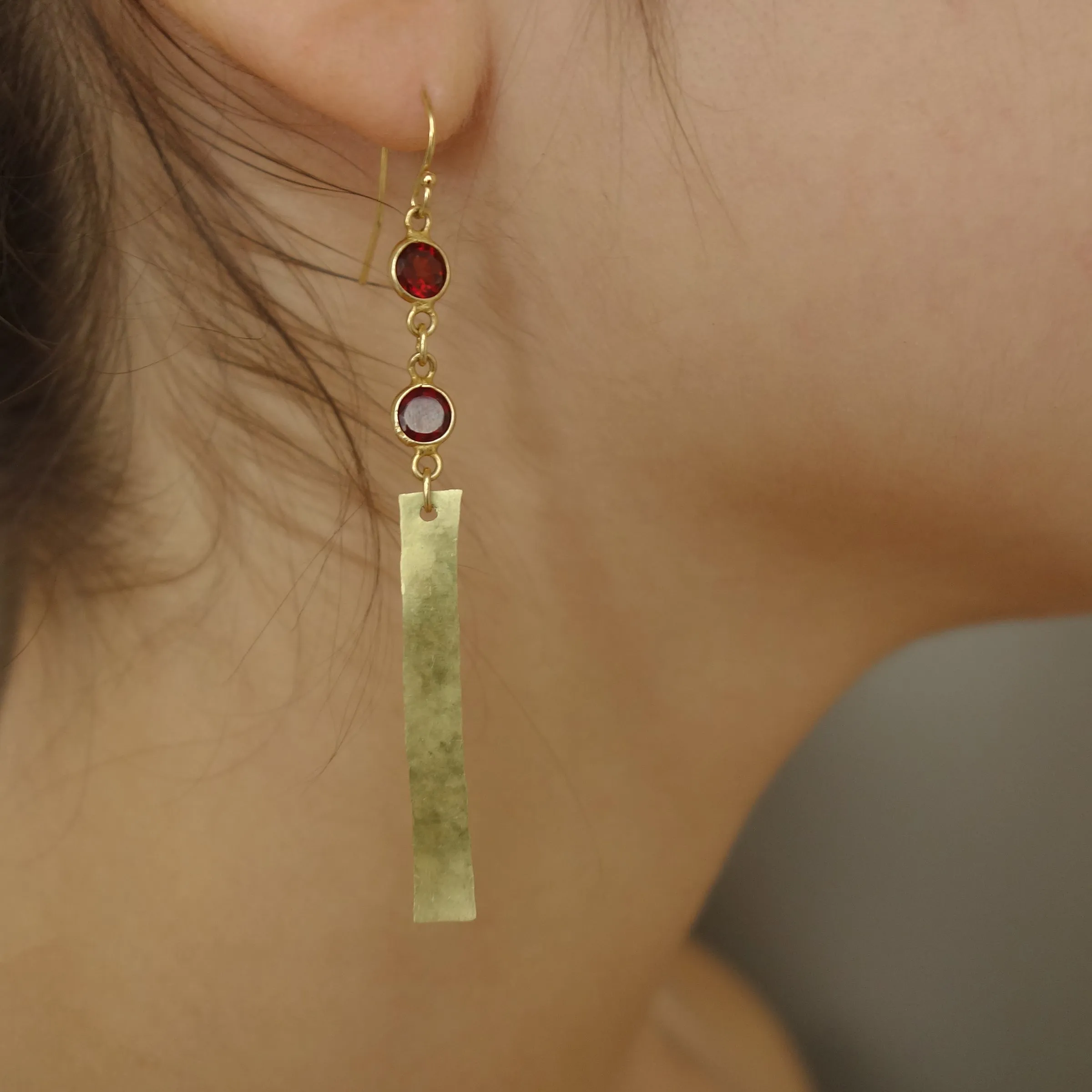 She Shines like Gold in the Sun (garnet, gold, and brass earring)