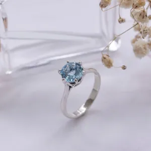 silver closed ring with blue topaz 8mm facet