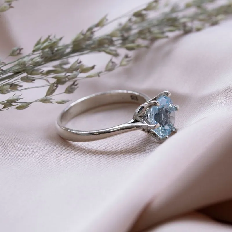 silver closed ring with blue topaz 8mm facet