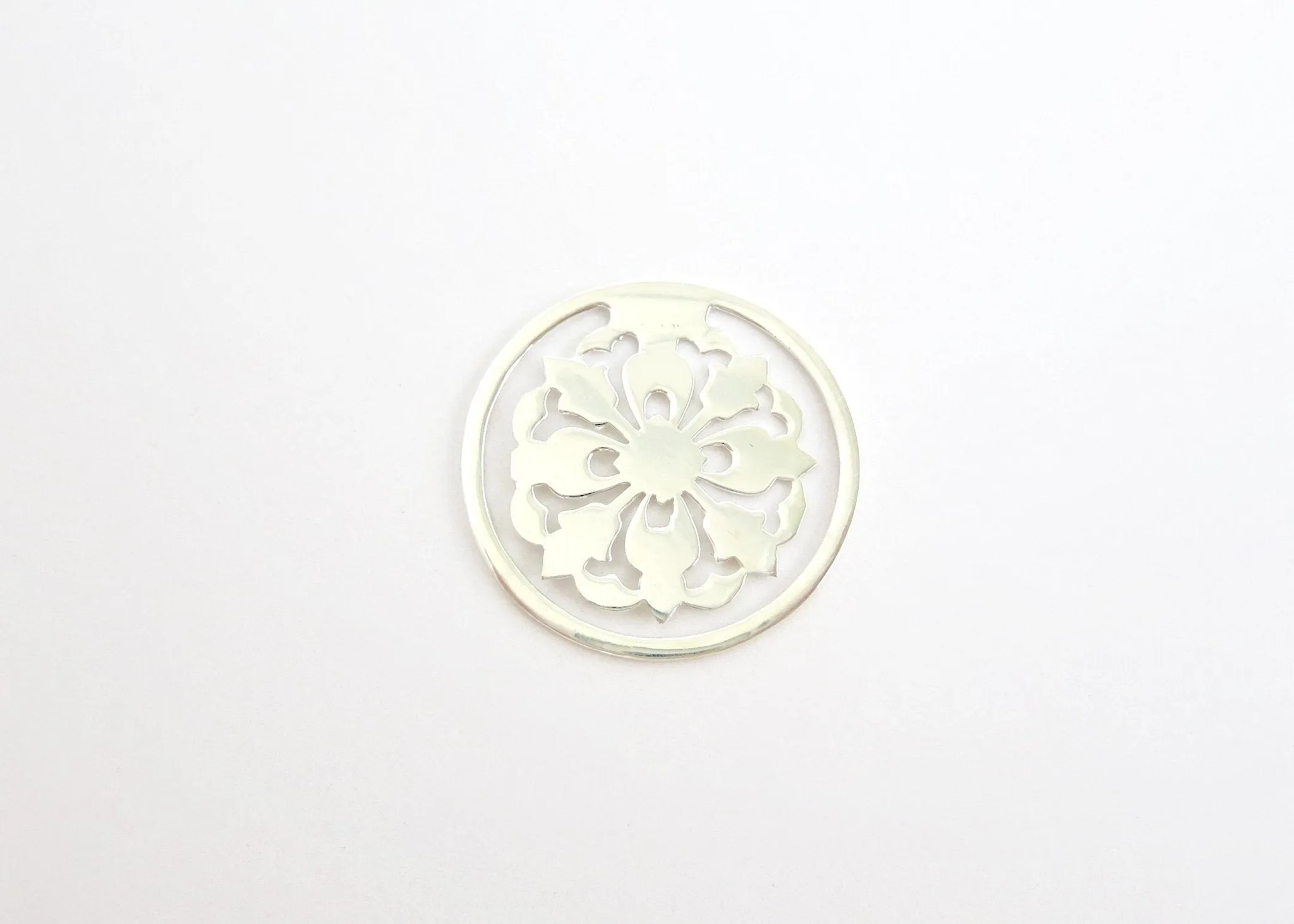 Small, round, floral pattern cutwork Bookmark