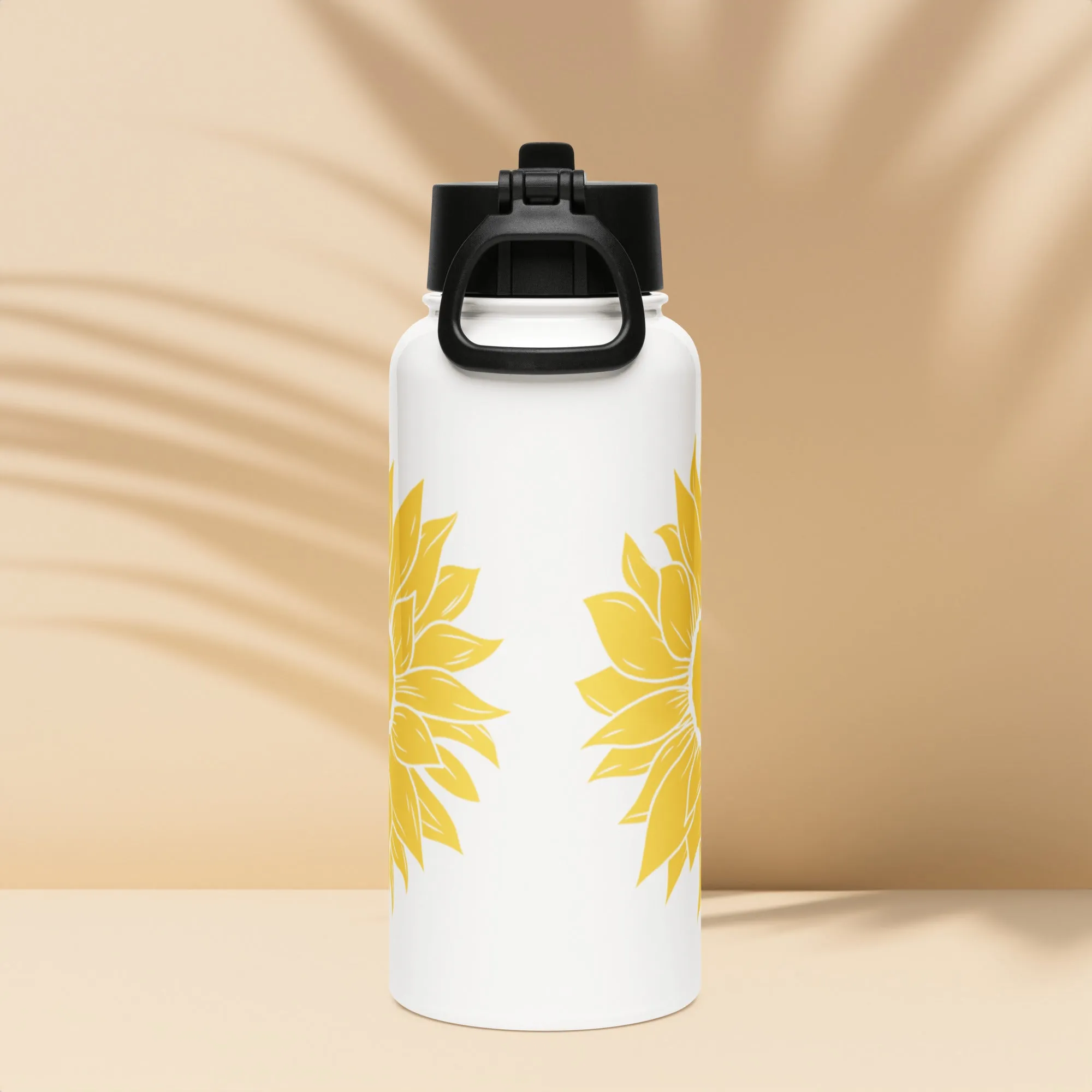 Stainless steel water bottle with a straw lid