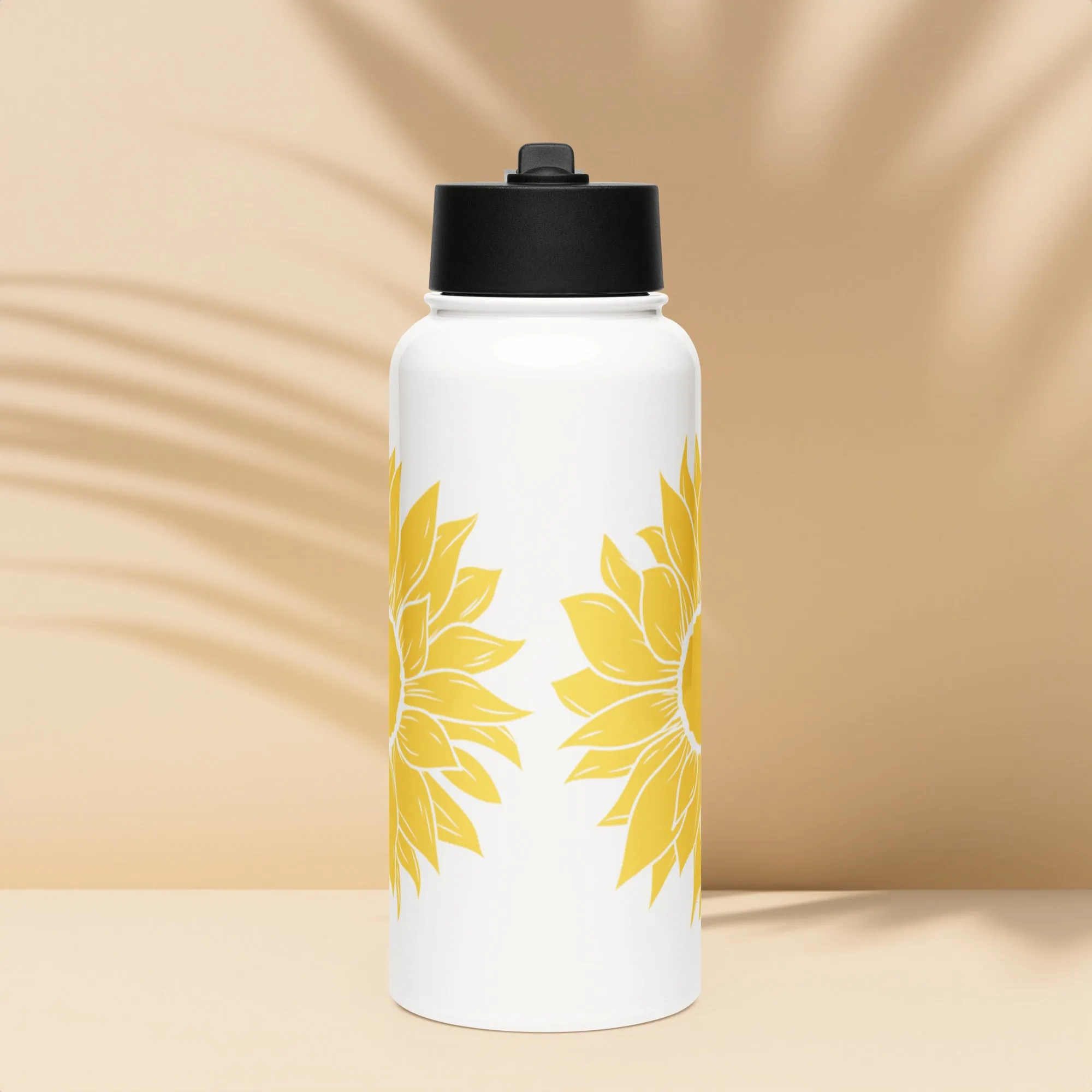 Stainless steel water bottle with a straw lid